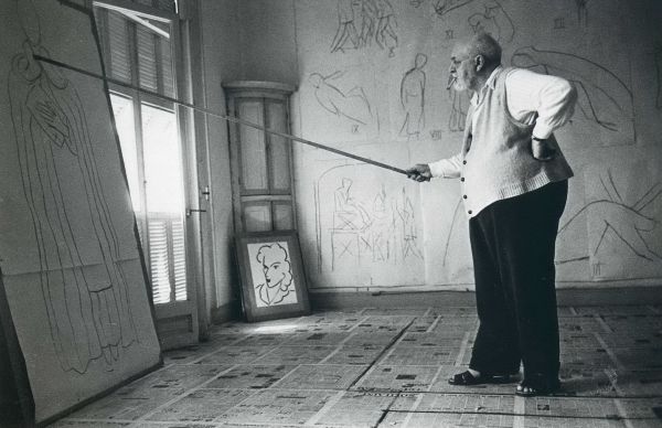Henri Matisse drawing with a bamboo pole tipped with charcoal. Cimiez (Nice), France, August 1948